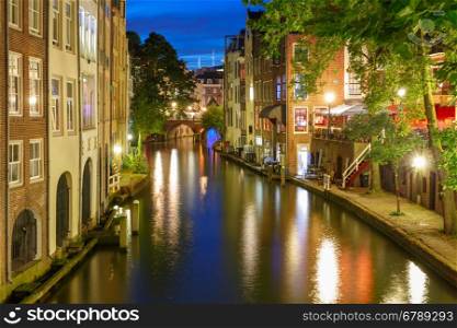 Canal Oudegracht in the night colorful illuminations in the blue hour, Utrecht, Netherlands