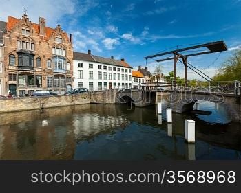 Canal with old bridge. Bruges (Brugge), Belgium