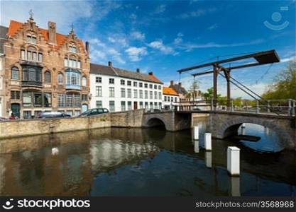 Canal with old bridge. Bruges (Brugge), Belgium