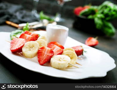 canape with strawberry and banana, fresh fruits, diet food