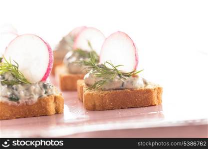 canapes with cream cheese pasta with dill and radish