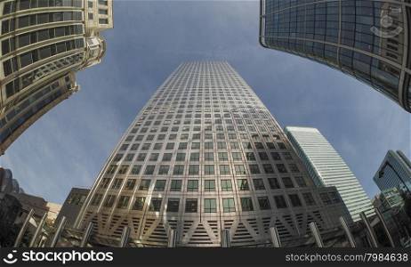 Canary Wharf skyline in London. The Canary Wharf business centre in London, UK seen with fisheye