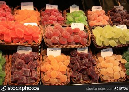 candied fruit candy in various colors at the market in Barcelona