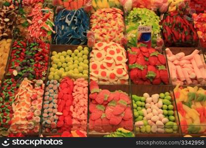 Candies in all colors and flavours displayed on a Spanish market