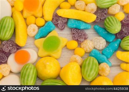 Candies with different shapes and colors close up