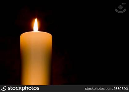 Candle Against Black Background