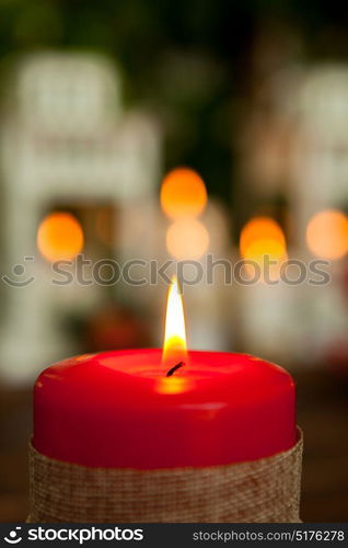 Candle for Christmas in red. Beautiful Holidays decoration