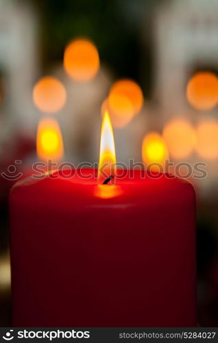 Candle for Christmas in red. Beautiful Holidays decoration