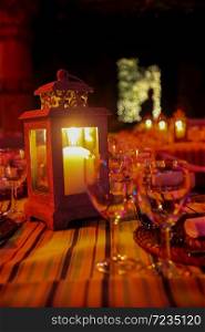 Candle in lantern for catering & decor purposes at corporate Christmas Gala Event Party