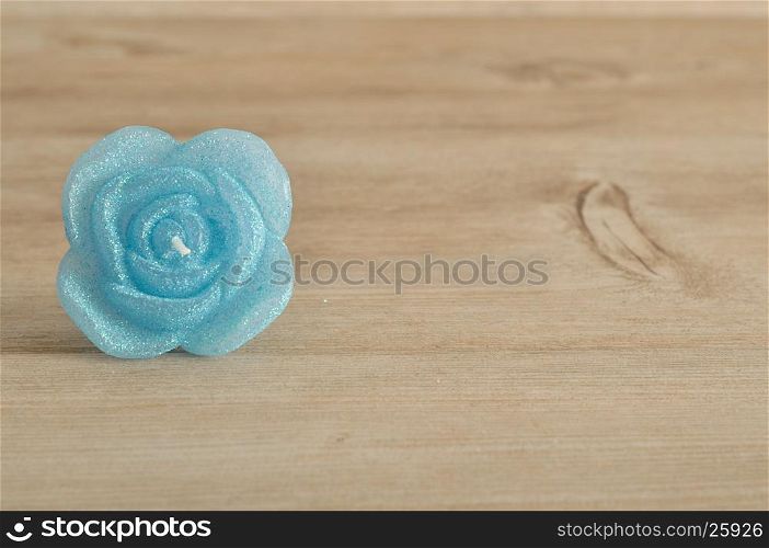 Candle in the shape of a rose