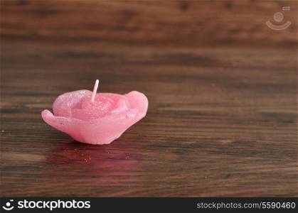Candle in the shape of a rose