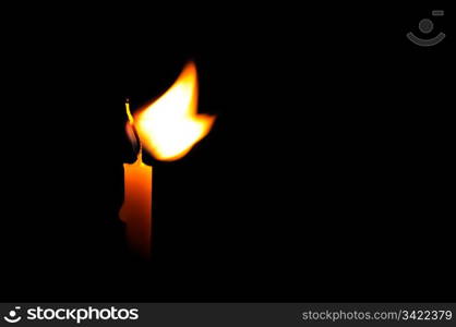 candle isolated on a black background