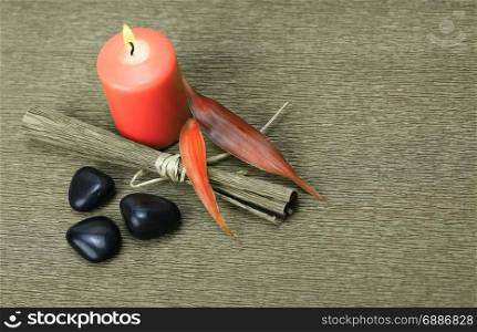 candle light and black stones
