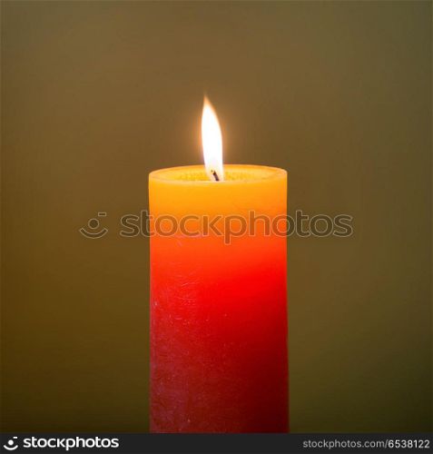 Candle light with flame. Candle light with flame on dark soft background