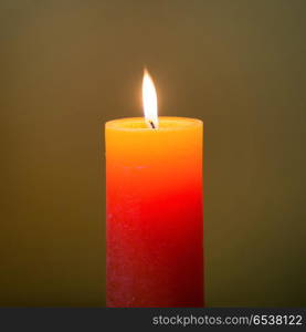 Candle light with flame. Candle light with flame on dark soft background