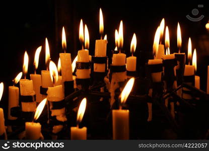 Candles and fire in the christian cathedral