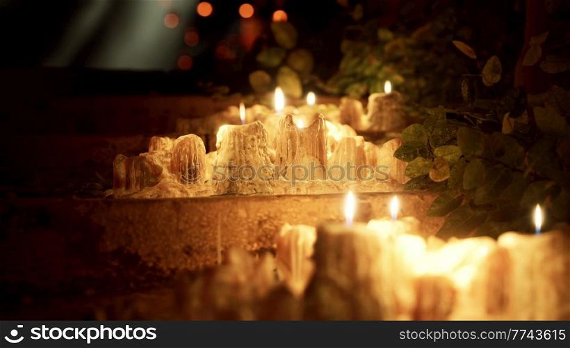 candles burning in the dark
