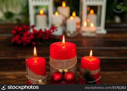 Candles for Christmas in red. Beautiful Holidays decoration