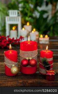 Candles for Christmas in red. Beautiful Holidays decoration