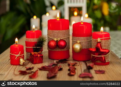 Candles for Christmas in red. Beautiful Holidays decoration