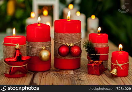 Candles for Christmas in red. Beautiful Holidays decoration