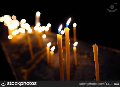 Candles in church, shallow depth of field