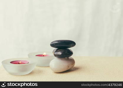 candles pile stones