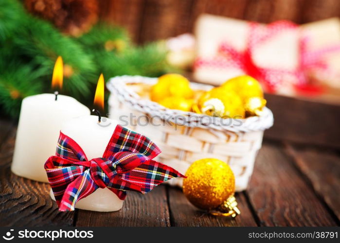 candles with ribbon on a table, christmas decoration