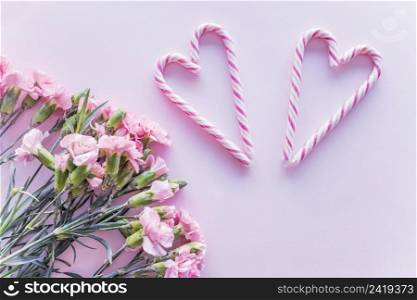 candy canes heart shape with flowers