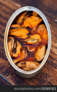 Canister of canned mussels. Healthy meal