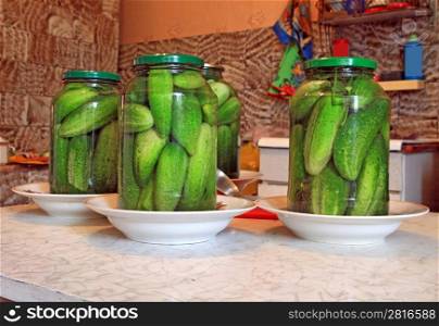 canned cucumber on kitchen table