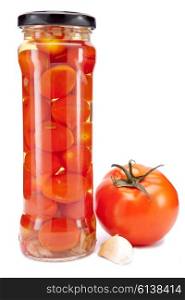 canned tomatoes in glass jars
