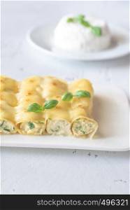 Cannelloni pasta stuffed with ricotta and spinach