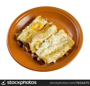 Cannelloni with beef ragu and topped with bechamel sauce.farmhouse kitchen