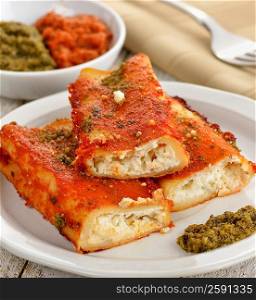 Cannelloni With Cheese , Tomato Sauce And Basil Pesto