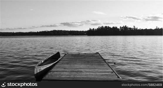 Canoe at the dock, Lake Of The Woods, Ontario, Canada