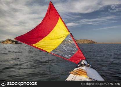 canoe bow with a downwind sail on Horsetooth Reservoir in Colorado near Fort Collins