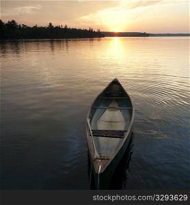 Canoe floating on the water at Lake of the Woods, Ontario