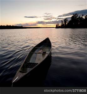 Canoe in a lake, Lake of the Woods, Ontario, Canada