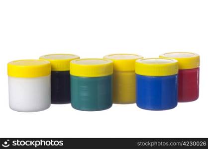 cans of water colors in the six primary colors on white background