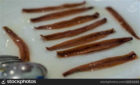 Cantabrian anchovies served as a starter, a salting preparation of anchovies (Engraulis encrasicholus); they are presented after cleaning, filleting, salting and dipping in olive oil