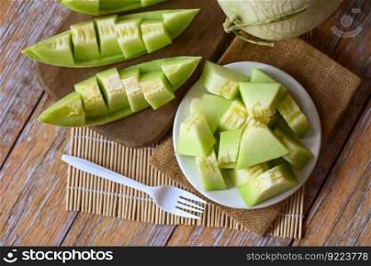 cantaloupe melon on plate wooden, cantaloupe thai slice fruit for health green cantaloupe thailand
