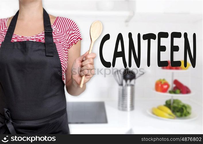 canteen cook holding wooden spoon concept background. canteen cook holding wooden spoon concept background.