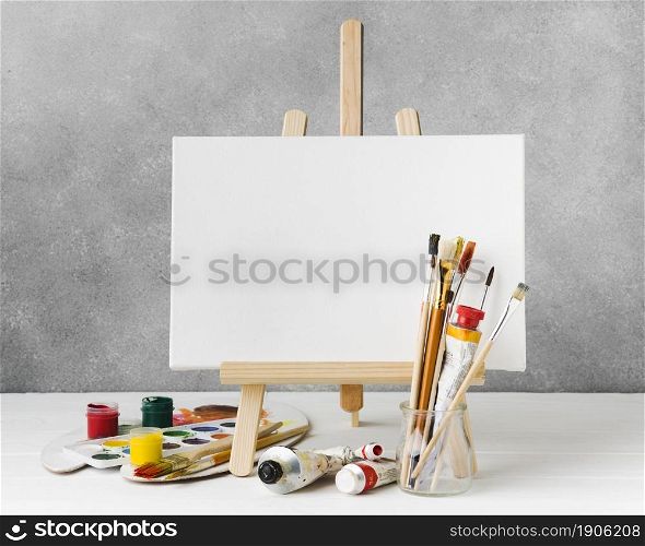 canvas easel watercolour paint front view. High resolution photo. canvas easel watercolour paint front view. High quality photo