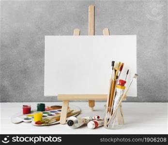 canvas easel watercolour paint front view. High resolution photo. canvas easel watercolour paint front view. High quality photo