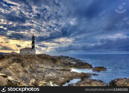 Cap de Favaritx sunset lighthouse cape in Mahon at Balearic Islands of Spain