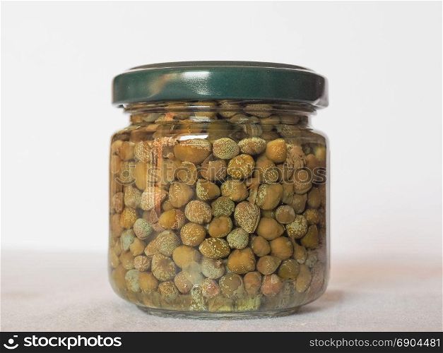 caper (Capparis spinosa) fruit food. green caper (Capparis spinosa) fruit vegetarian salted food in a jar