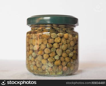 caper (Capparis spinosa) fruit food. green caper (Capparis spinosa) fruit vegetarian salted food in a jar