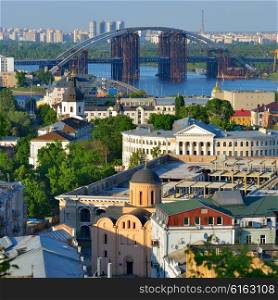 Capital of Ukraine, Kyiv. Beautiful view of the old district of Podil and the Dnieper River in Kiev.
