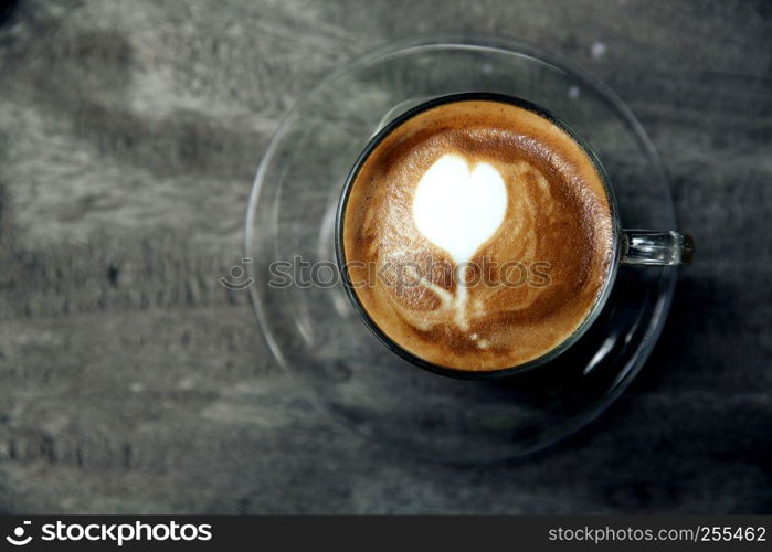 cappuccino coffee on wood background